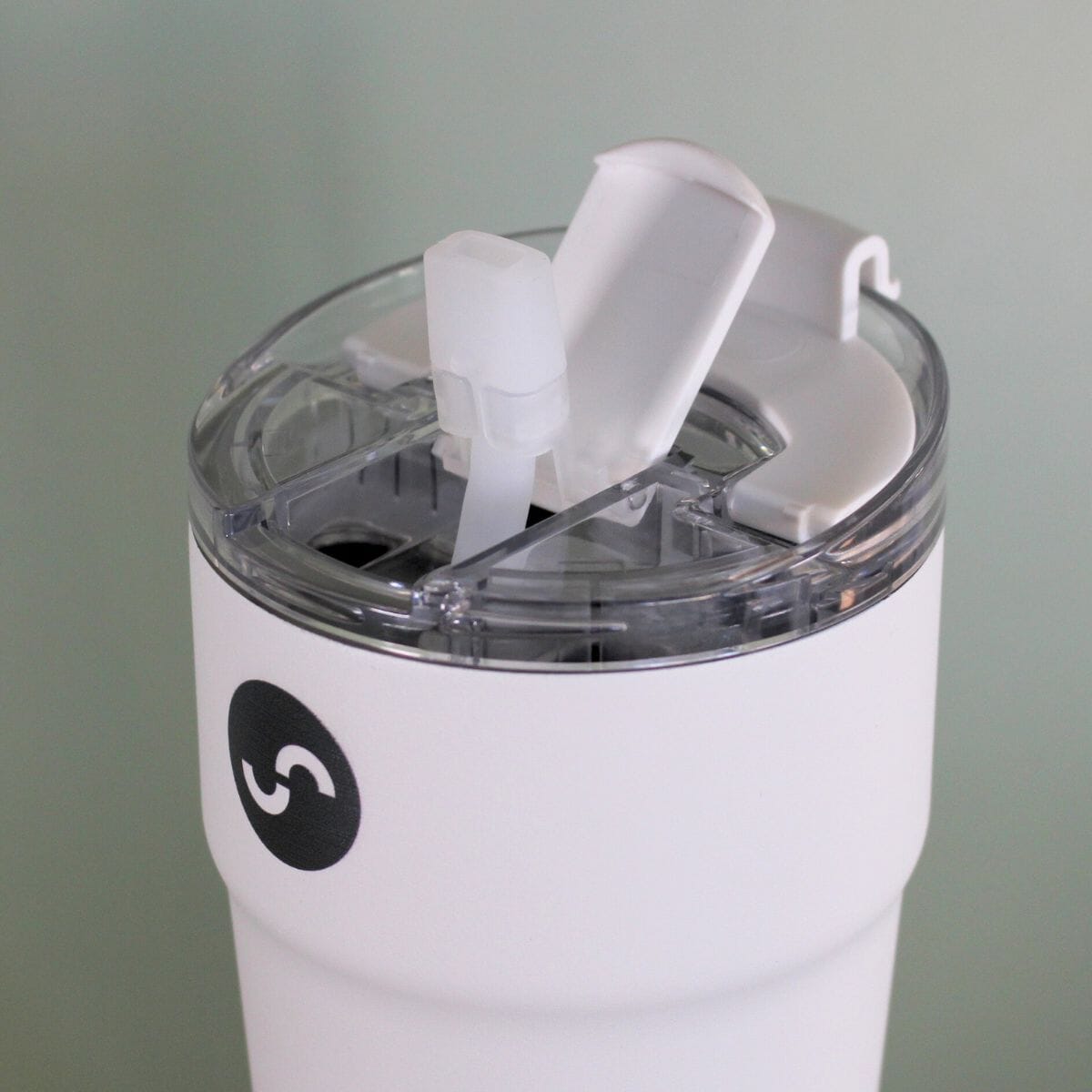 Angled top view of the Splitflask hot and cold tumbler with the flip straw opened